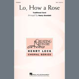 Download Traditional Carol Lo, How A Rose (arr. Nancy Grundahl) sheet music and printable PDF music notes